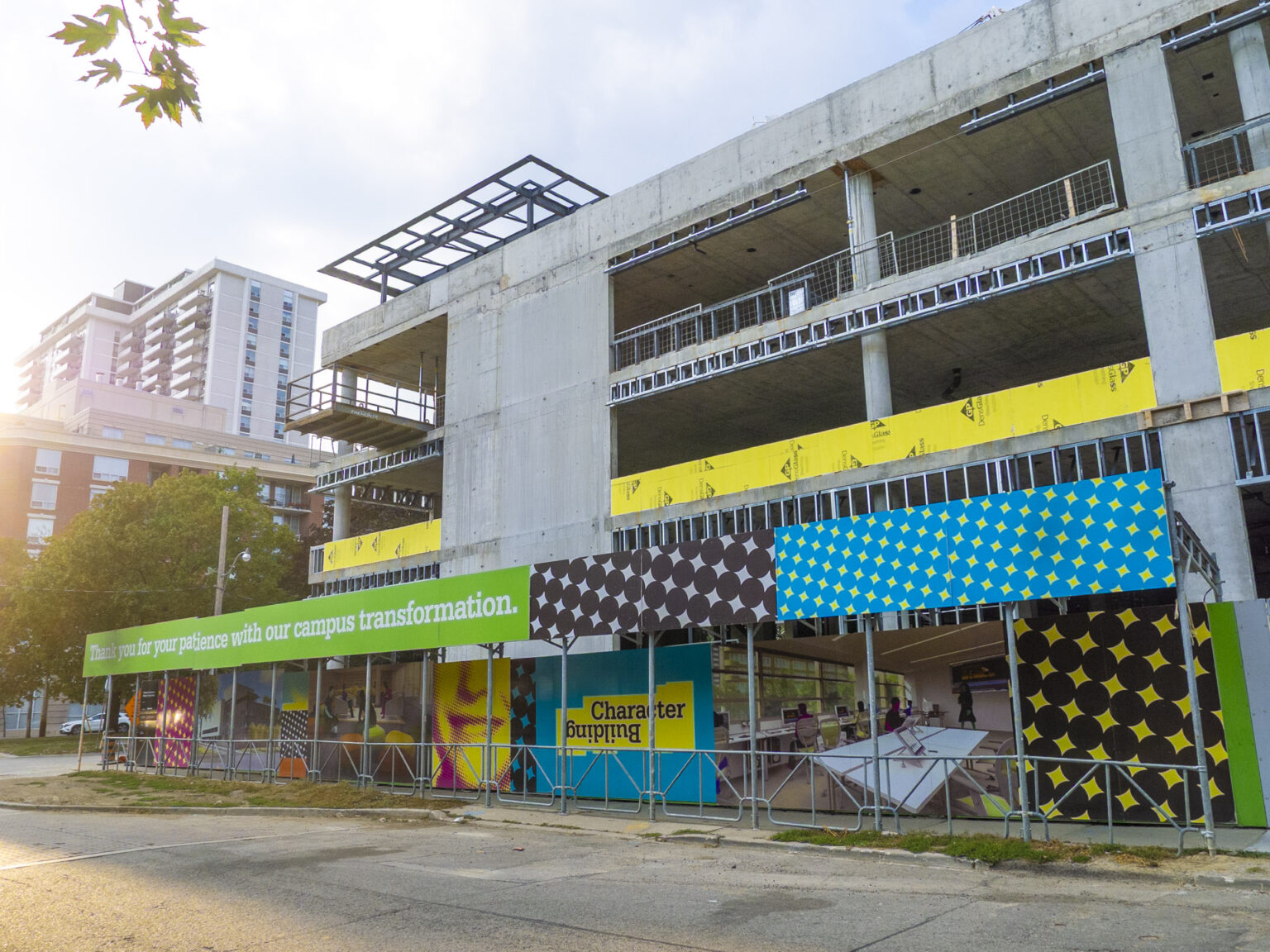 Greenwood College School Construction with Campaign Design Visuals on Hoarding